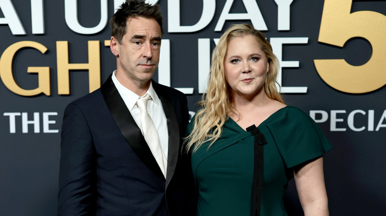 Amy Schumer and Chris Fischer at an event