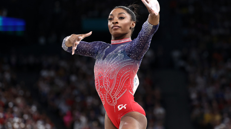 Simone Biles wears blue to red ombre leotard at the 2024 Paris Olympics