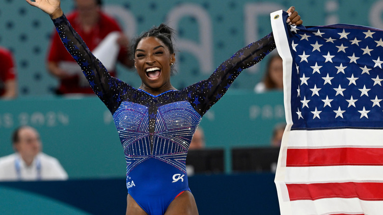Simone Biles wears shiny blue leotard at the 2024 Paris Olympics