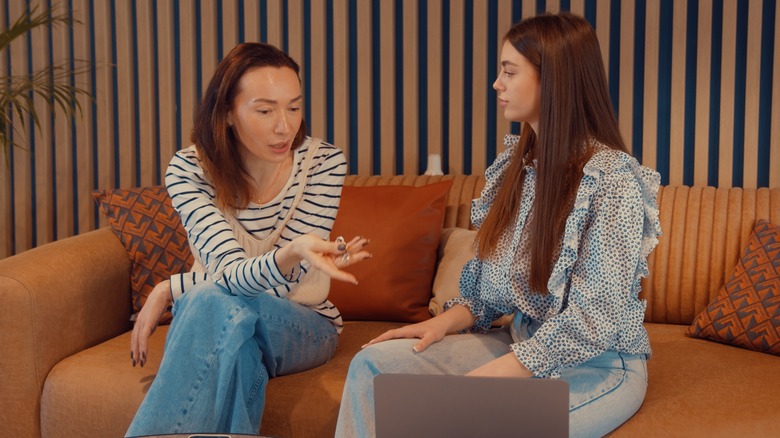Two people talking