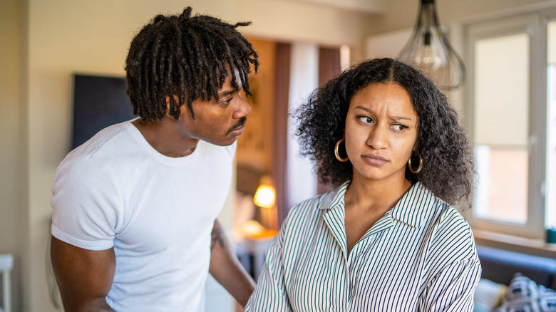 Woman ignoring a man