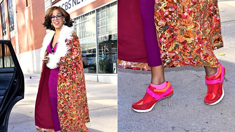 Gayle King wearing a lively floral jacket with pink sneaker-heels
