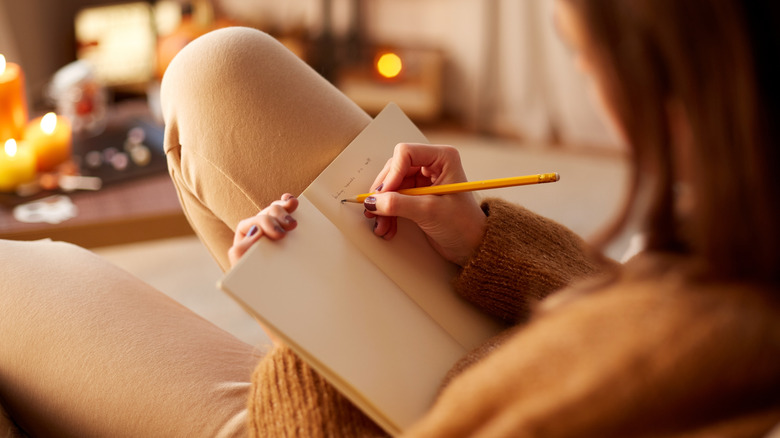 Woman journaling alone