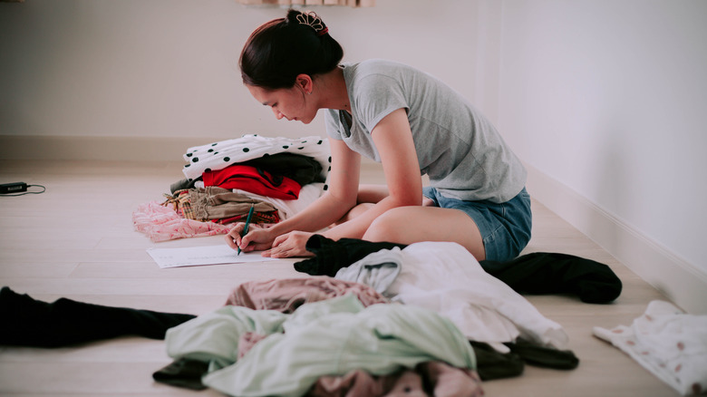Woman organizing clothes