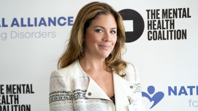 Sophie Grégoire posing with a small smile at a 2023 mental health event