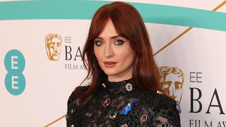 Sophie Turner on the red carpet with red hair