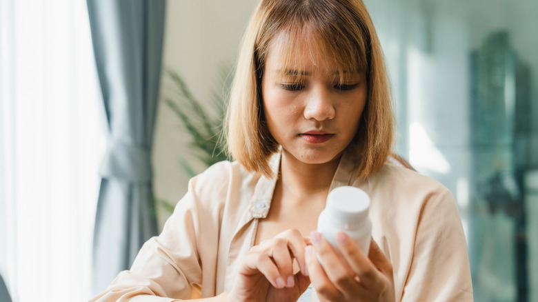 Inspecting pill bottle