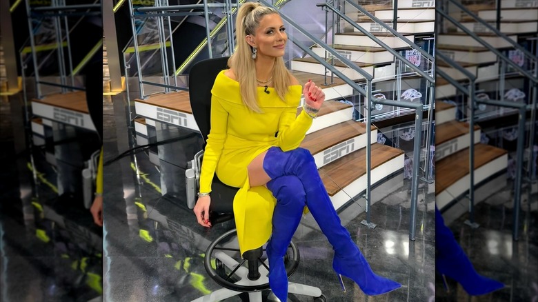 Laura Rutledge in an a yellow dress with blue boots