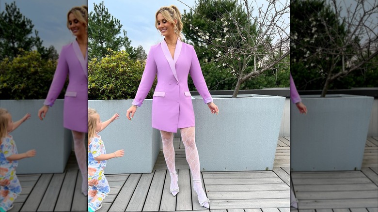 Laura Rutledge in a lavender blazer dress