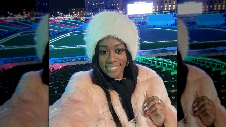 Wearing fur hat