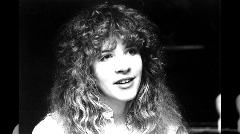 Black-and-white close up photo of Stevie Nicks in 1974