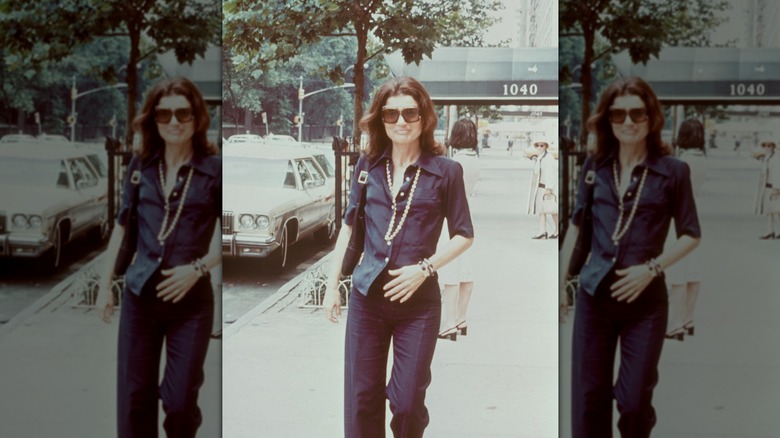 Jacqueline Kennedy Onassis walking down the streets of New York; circa 1970