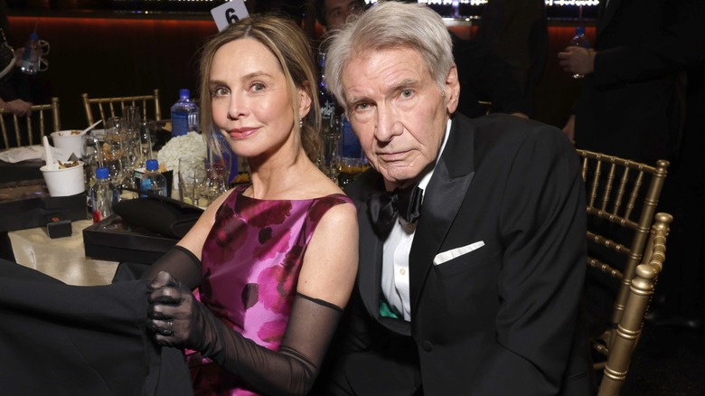 Calista Flockhart and Harrison Ford sitting together