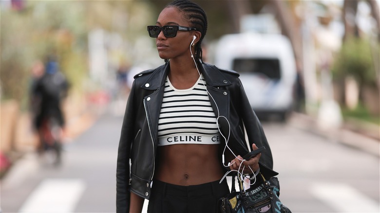 model in striped midriff top