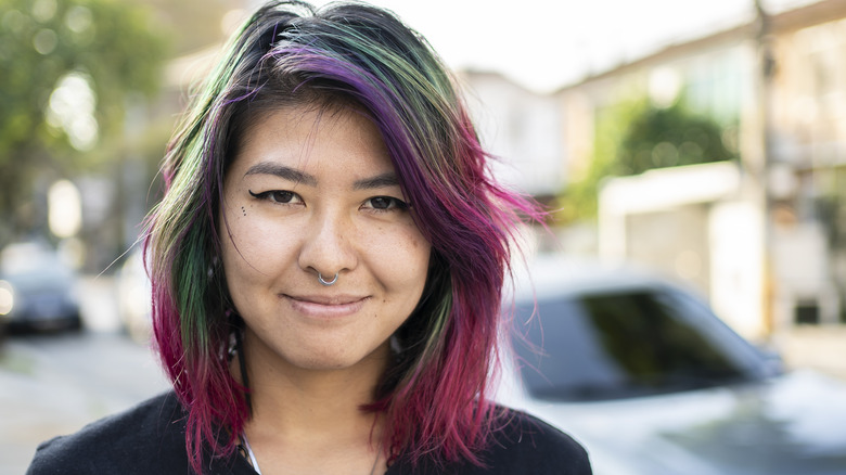 Woman with pink hair