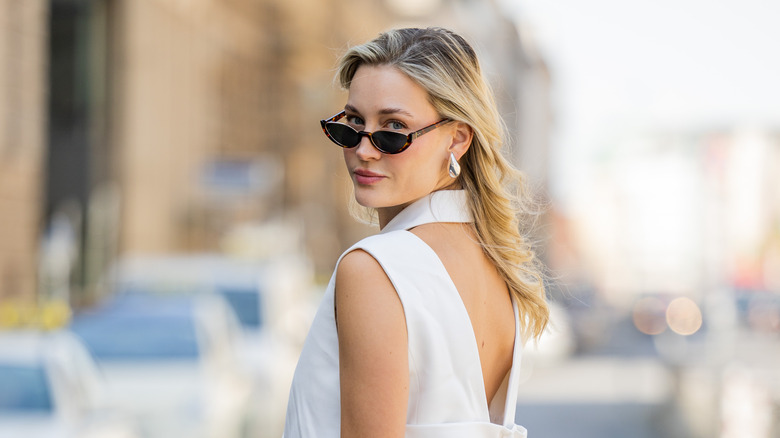 woman in tortise cateye sunglasses