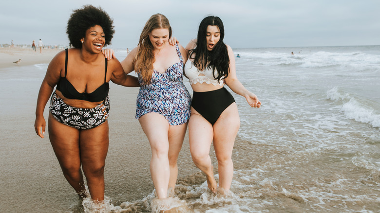 Plus size women on beach