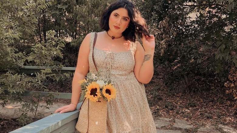 Woman wearing sundress and choker