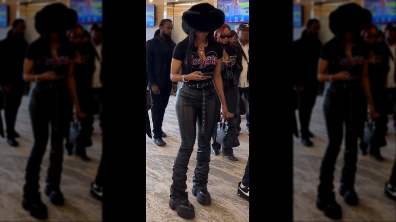 Ciara at the Super Bowl in a large har