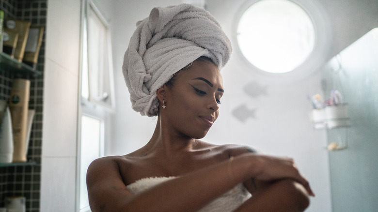 Woman in towel after shower