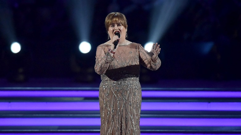 Susan Boyle performing on stage in 2019