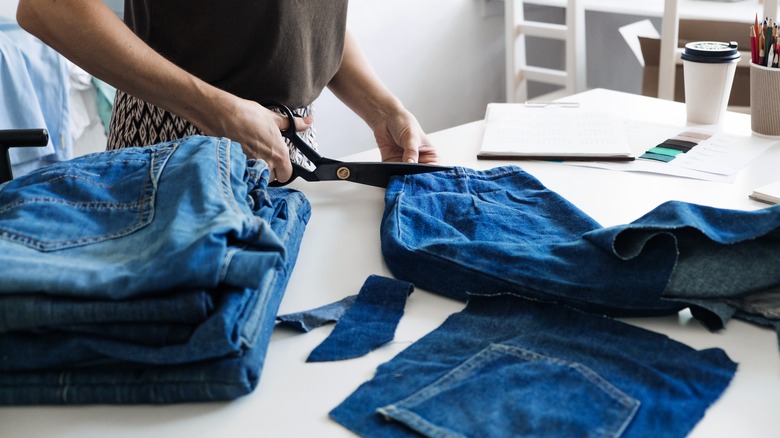 Person repurposing jeans