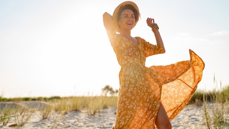 Woman in orange sundress