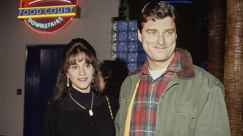 Jami Gertz and Tony Ressler smiling at a premiere in 1991