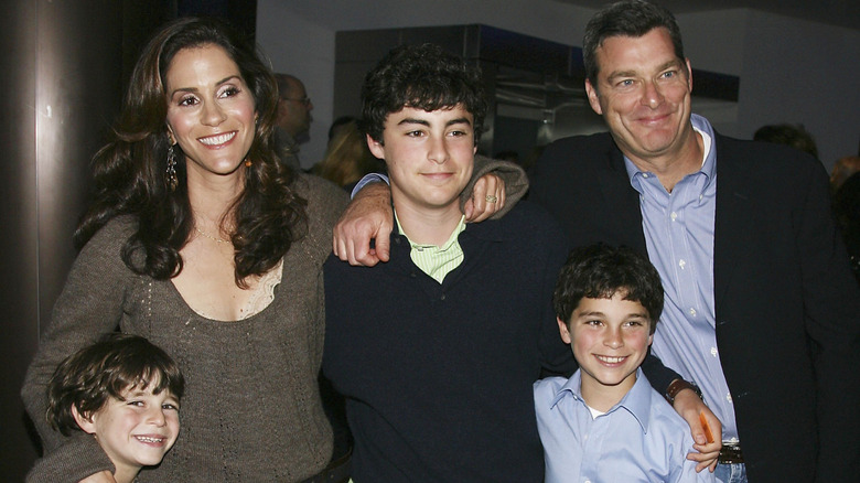 Tony Ressler, Jami Gertz, and their three sons at a premiere in 2006
