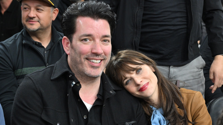 Jonathan Scott and Zooey Deschanel attend a basketball game between the Los Angeles Clippers and the Los Angeles Lakers at Intuit Dome on January 22, 2026