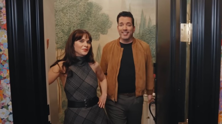 A snap of Zooey Deschanel and Jonathan Scott on their Architectural Digest home tour in October 2025