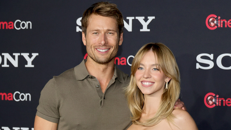 Glen Powell and Sydney Sweeney posing together at CinemaCon