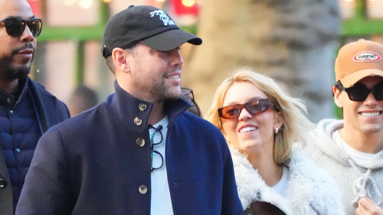 Scoot Braun and Sydney Sweeney walking next to each other