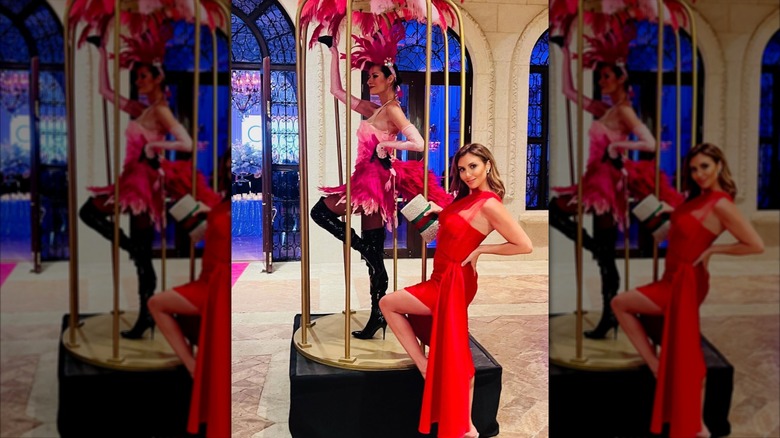 Alina Habba at an event in a red dress