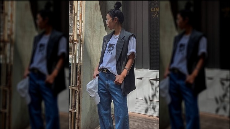 Vest worn with oversized shirt