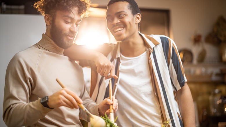 Couple talking over salad