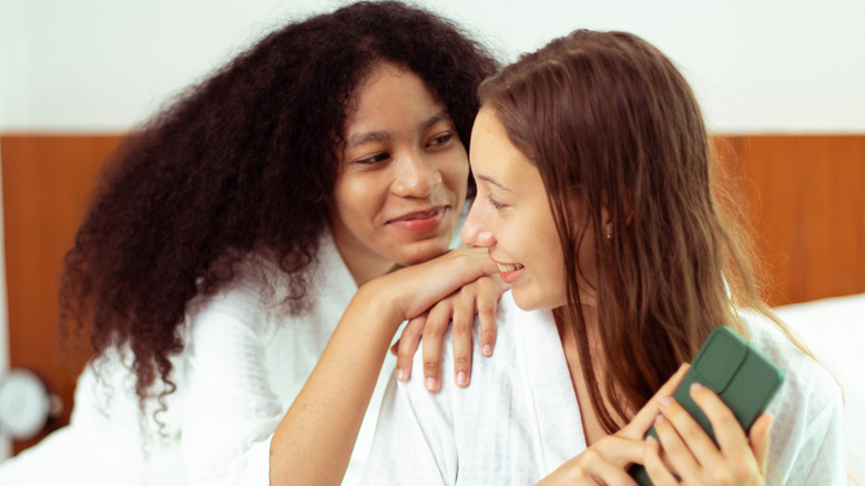 Two women in bed