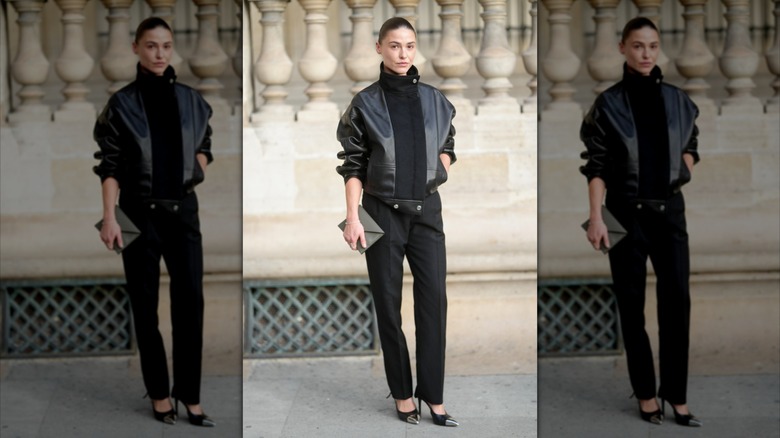 A guest is photographed during Day Nine of Paris Fashion Week