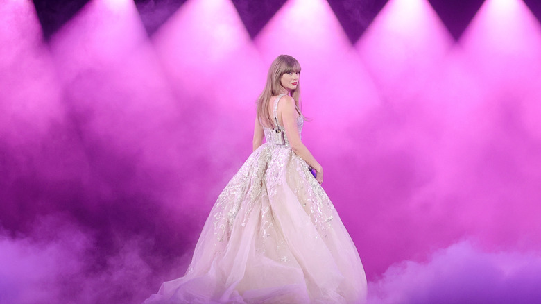 Taylor Swift looking back during performance