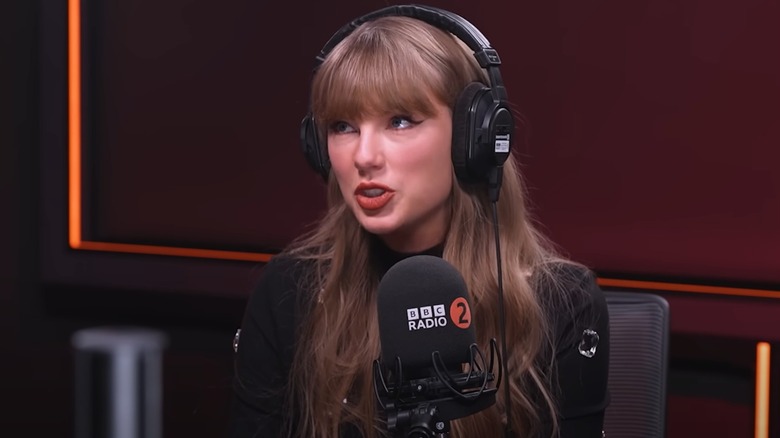 Taylor Swift in an embellished black top