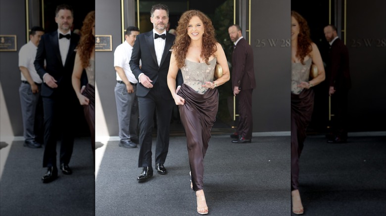 Abigail Anderson leaving her hotel in a brown dress on July 3, 2026.