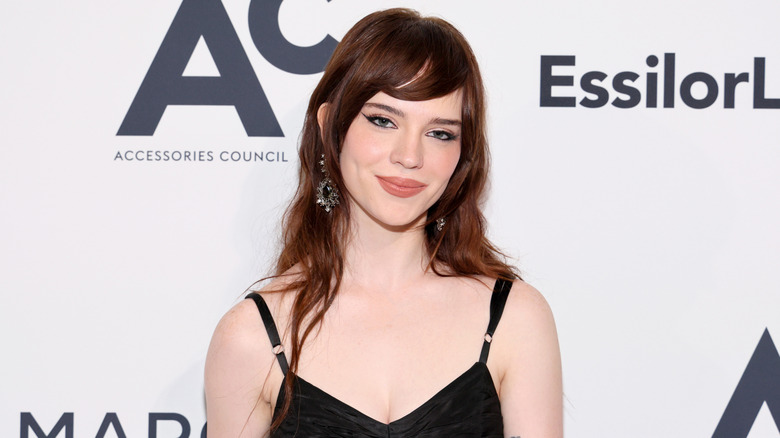 Sophie Thatcher posing with a small smile at a 2024 event