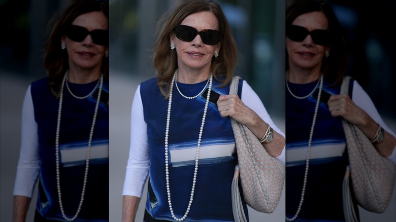 Woman wearing diamonds and pearls