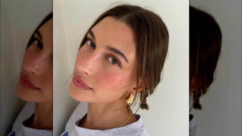 Hailey Bieber posing