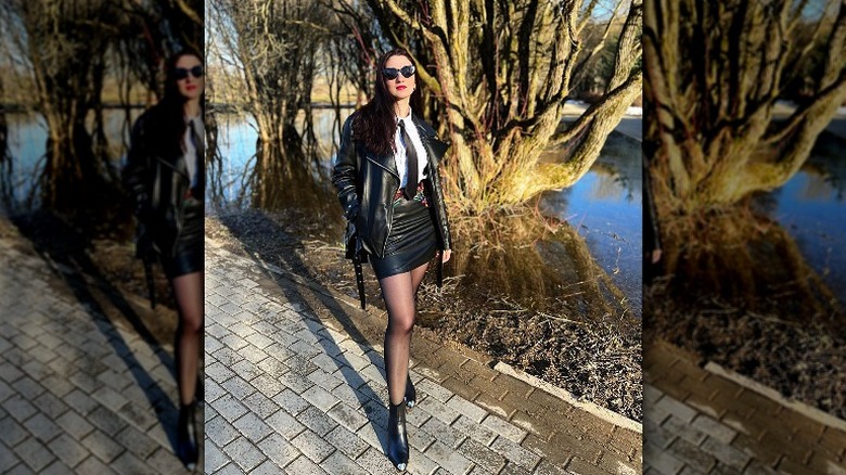 Woman in tie and leather jacket