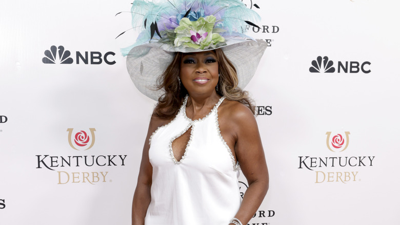 Star Jones with a big floral hat