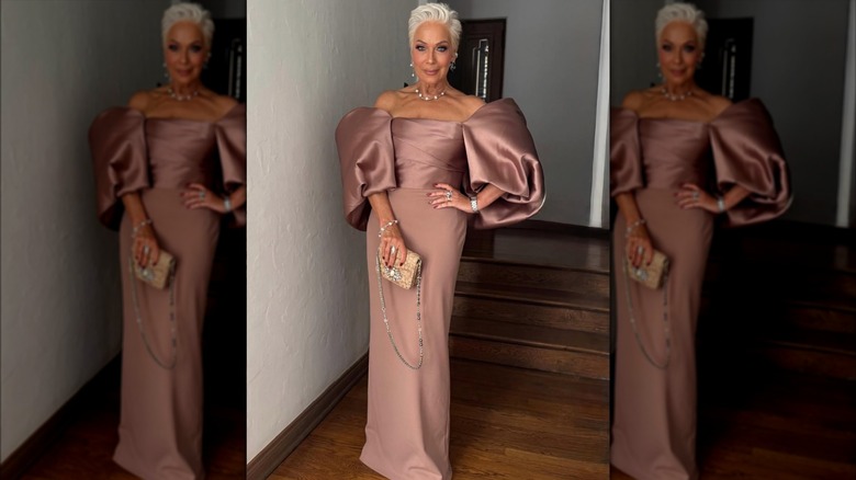 Denise Welch poses in an antique rose gown before her son's wedding