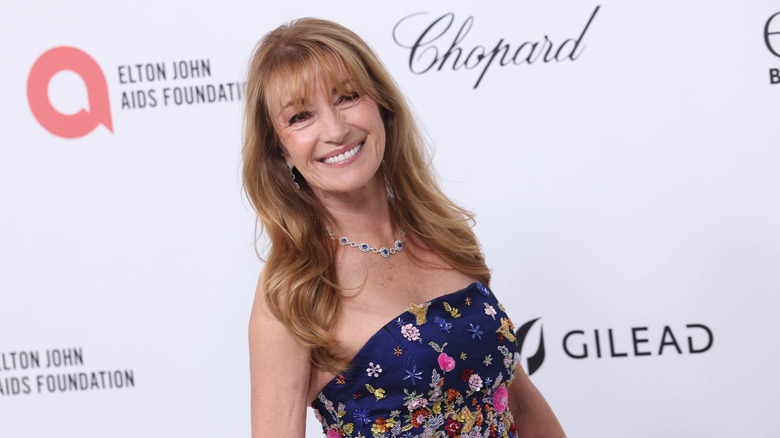 Jane Seymour in a strapless blue floral gown at an event