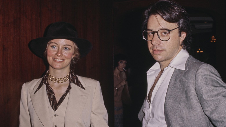 Cybill Shepherd in a dagger collar and Peter Bogdanovich in 1976