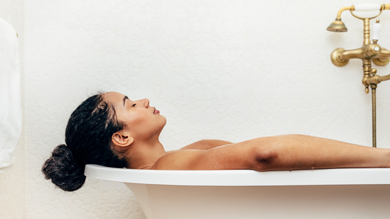 Woman taking bath